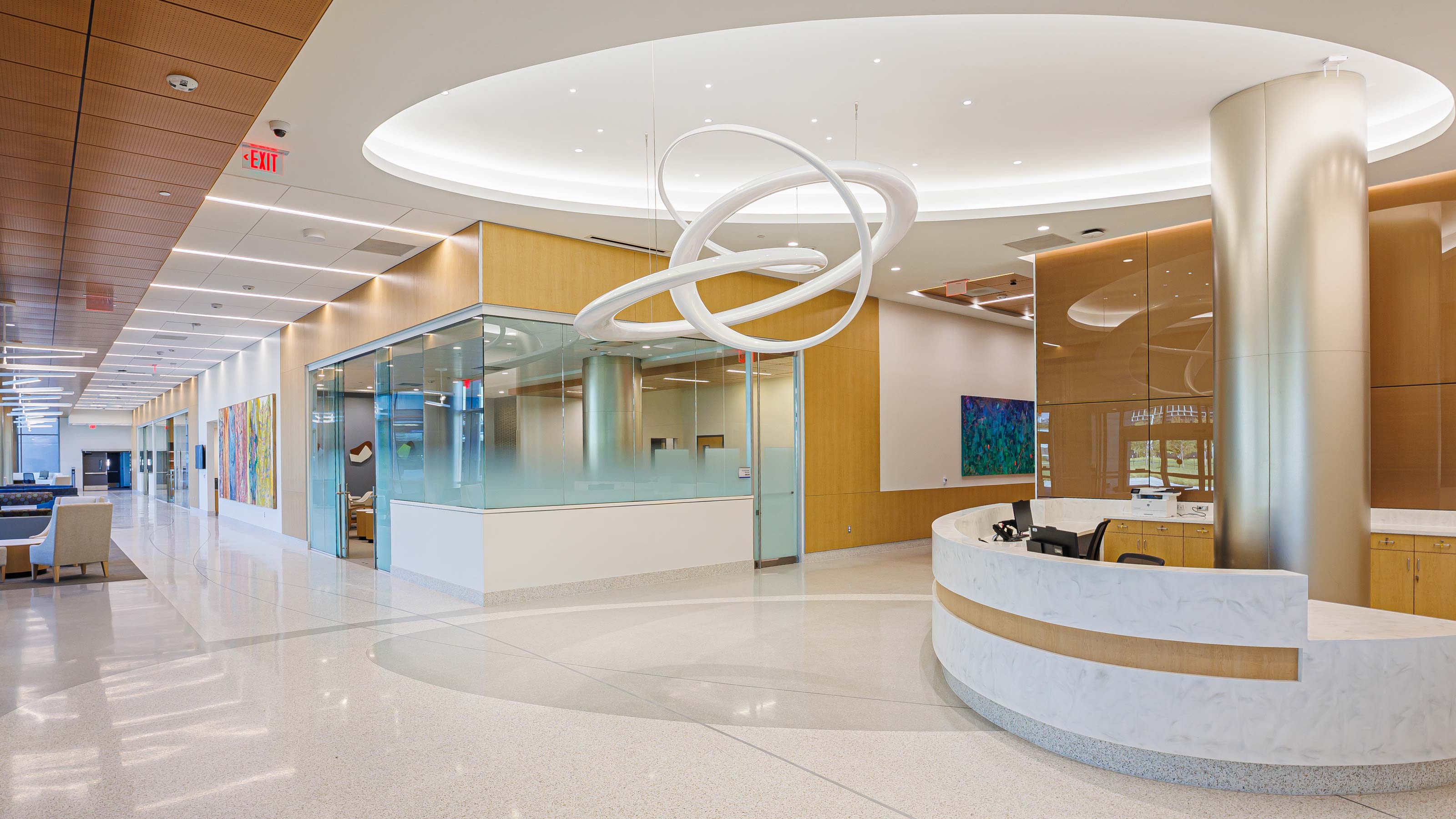 Swirling white sculpture suspended from the ceiling