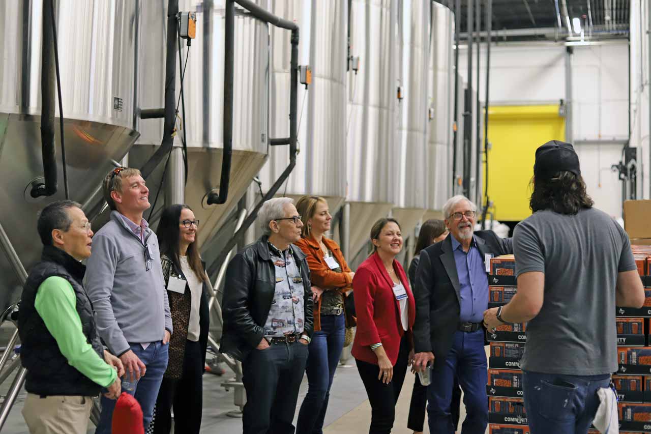 UT Southwestern alumni on a tour of Community Beer Co.