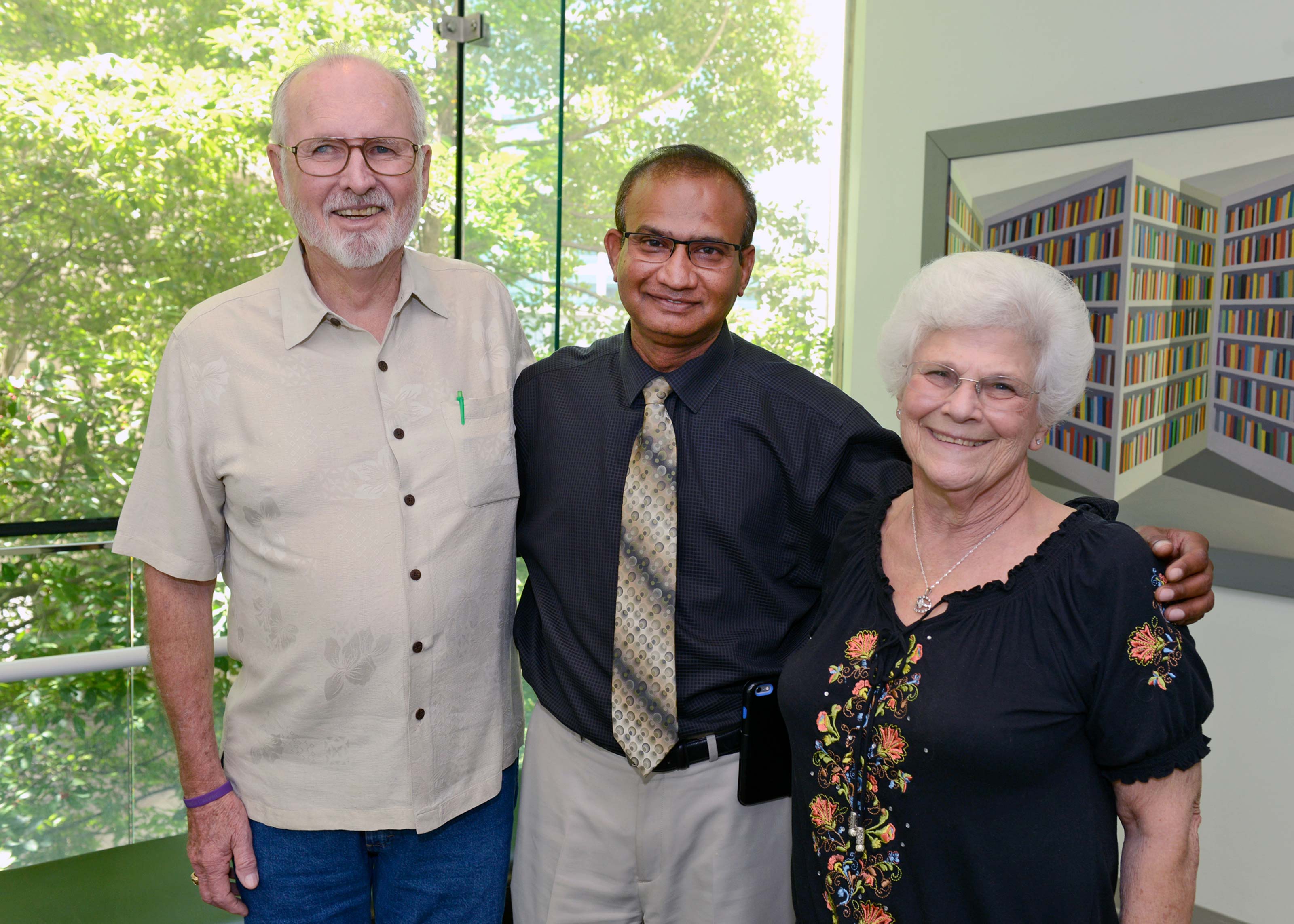 Photo of Ray Calvert, Dr. Udit Verma, and Paula Calvert