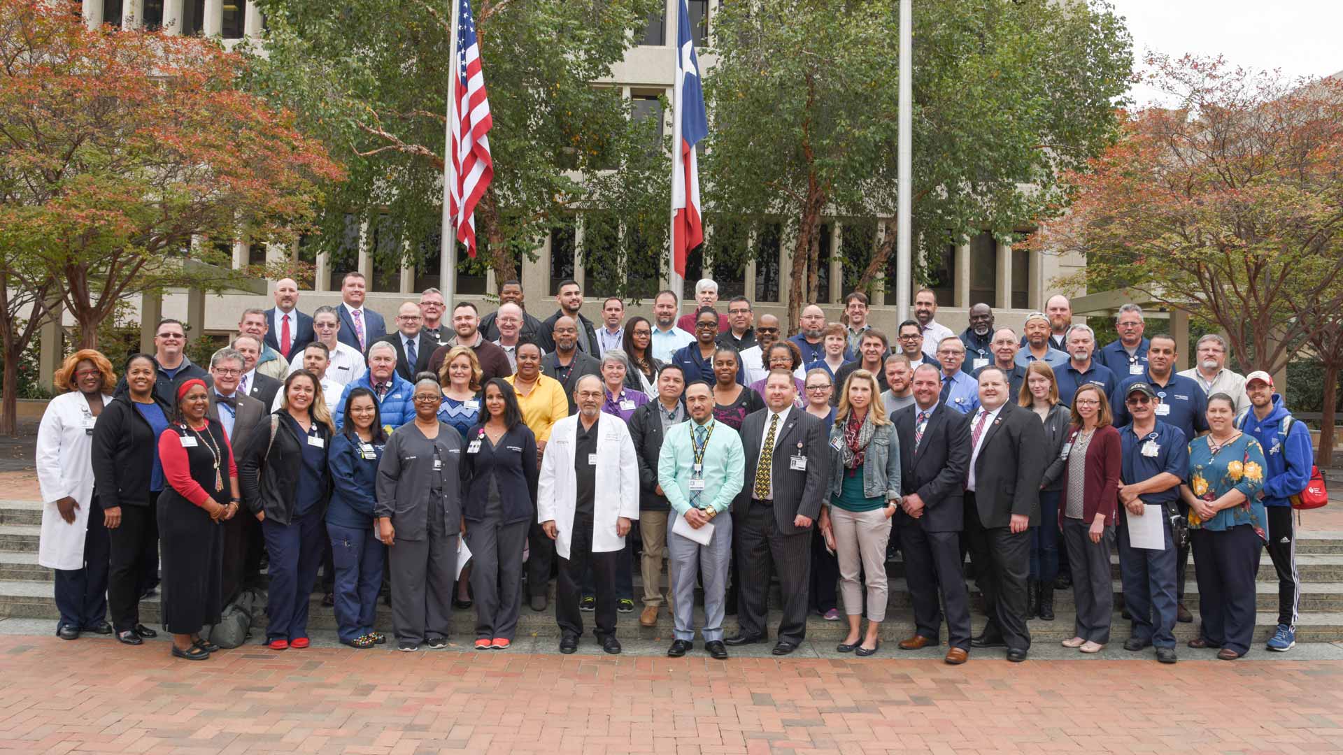 UT Southwestern employees who served in the military pose for a group photo