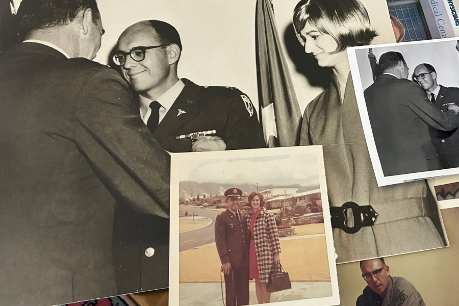 Photographs of Dr. Lannie Hughes laid out on a table